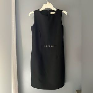 A woman’s elegant black dress